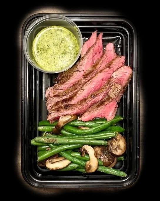 Garlic Steak Bites & Creamy Mash in a meal prep container